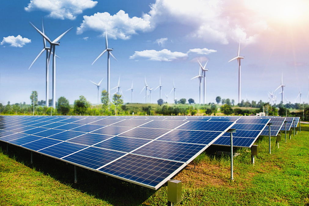 221130 solar panel with wind turbines against mountains sky orig